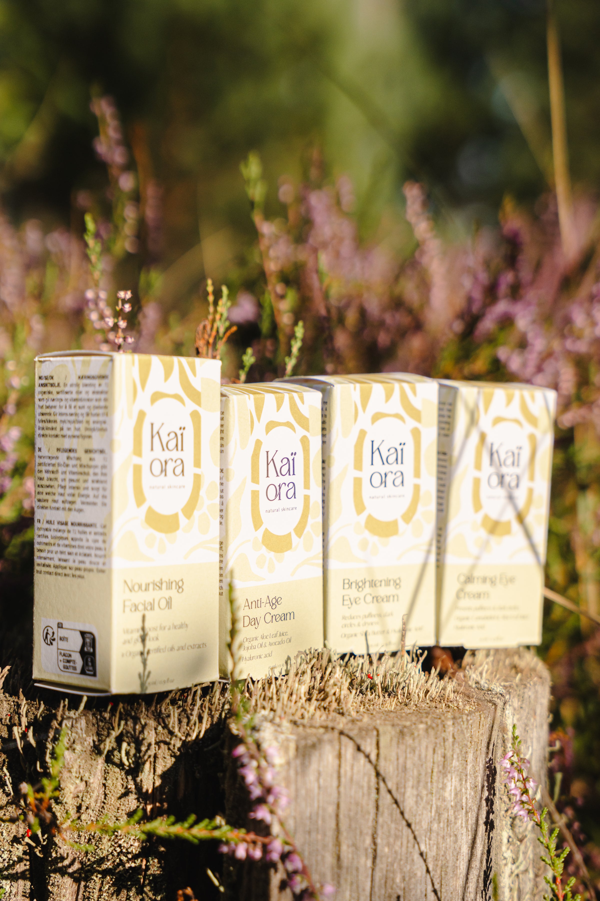 Kai Ora skincare products on a wooden surface with a natural background