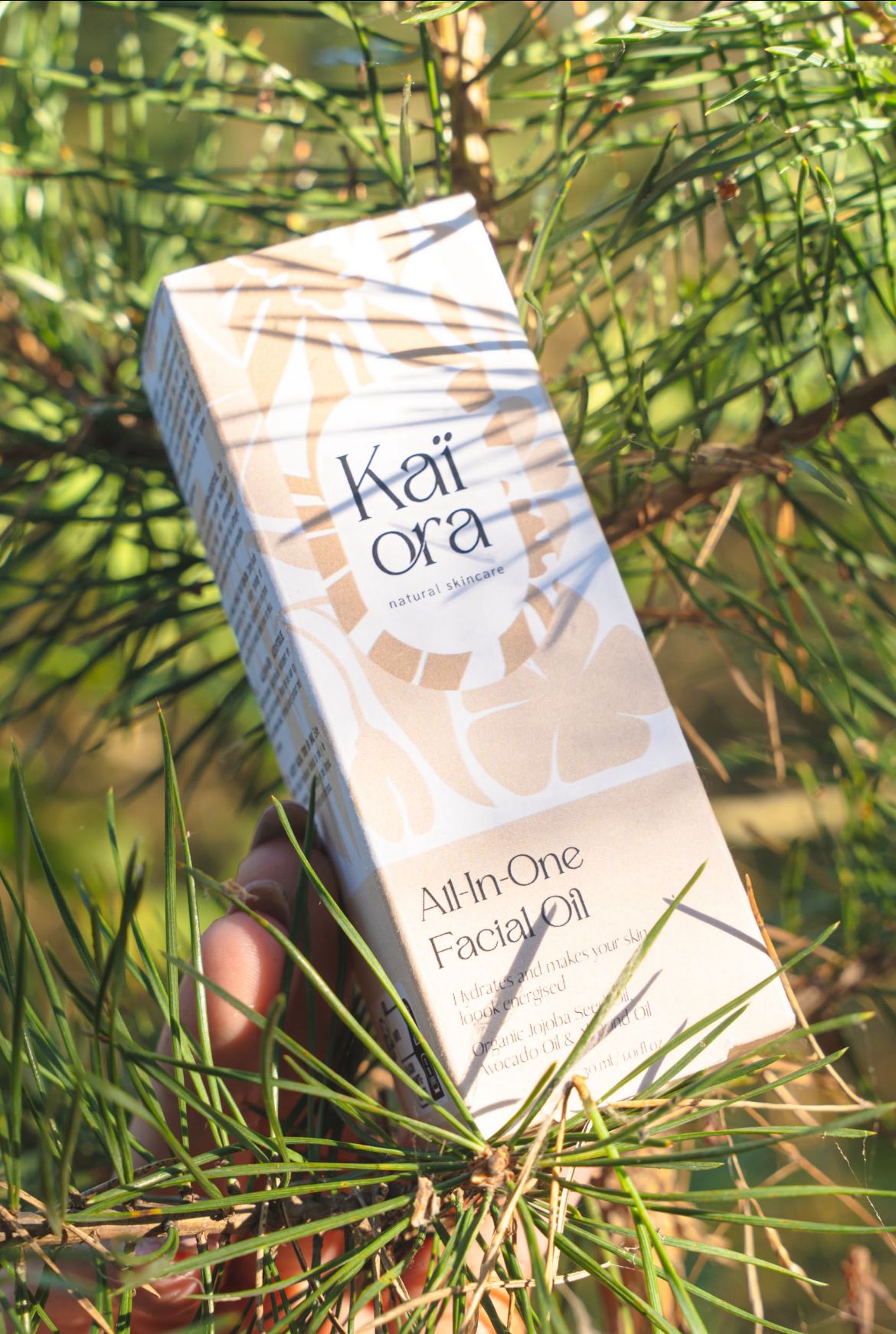 KAI ORA all in one facial oil in a pine tree